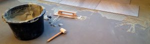 Tegelvloer leggen materiaal tegelzetter